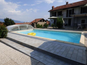 Attractive holiday home in Castellveccana with private pool